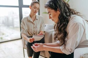 person contemplating mental health while in session in a depression therapy program